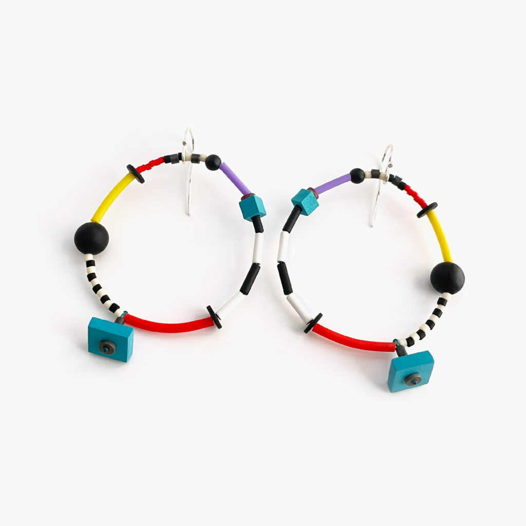 Pair of colorful geometric hoop earrings with black beads