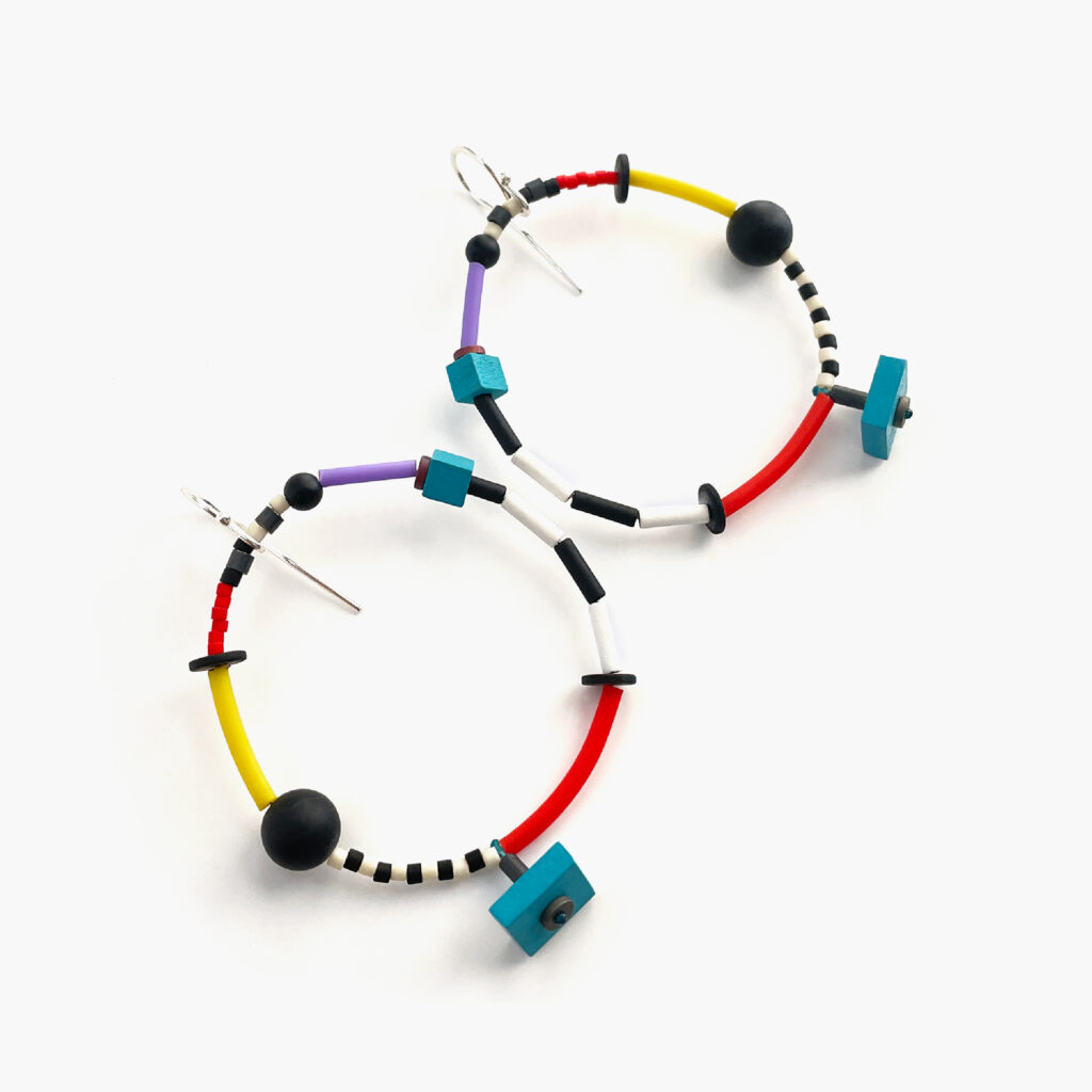 Colorful statement hoop earrings with turquoise, red and yellow details