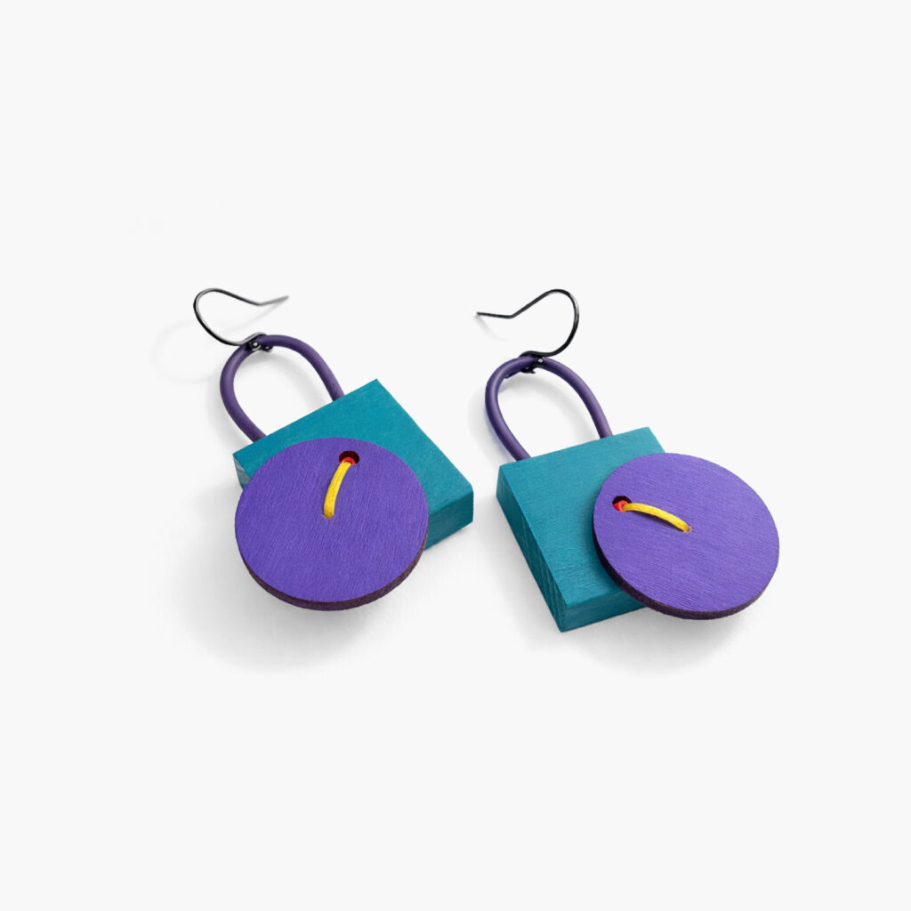 Asymmetrical purple and turquoise wooden earrings with layered geometric shapes