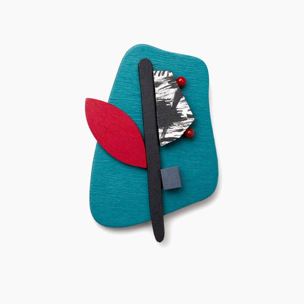 Petrol abstract brooch with red leaf and black graphic elements